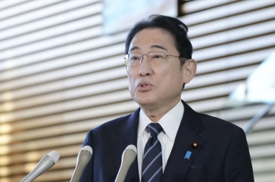 Prime Minister Fumio Kishida speaks to reporters in Tokyo on Monday.