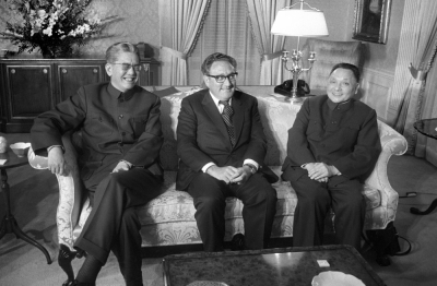 Then-U.S. Secretary of State Henry Kissinger (center) meets with Chinese Foreign Minister Chiao Kuan-Hua (left) and Chinese Vice Premier Deng Xiaoping in New York in 1974. Kissinger died last Wednesday at age 100.