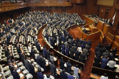 The Lower House plenary session approves the relief bill in Tokyo on Tuesday.