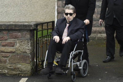 The former lead singer of The Pogues, Shane MacGowan, attends the funeral service of his mother in Silvermines, Ireland, in January 2017. 