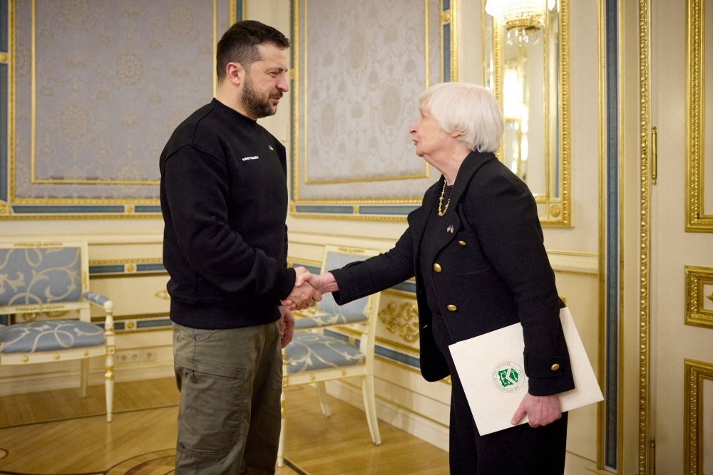 Ukrainian President Volodymyr Zelenskyy greets U.S. Treasury Secretary Janet Yellen in Kyiv on Feb. 27. Zelenskyy's chief of staff Andriy Yermak said on Tuesday that the postponement of U.S. assistance for Kyiv being debated in Congress would create a "big risk" of Ukraine losing the war with Russia.