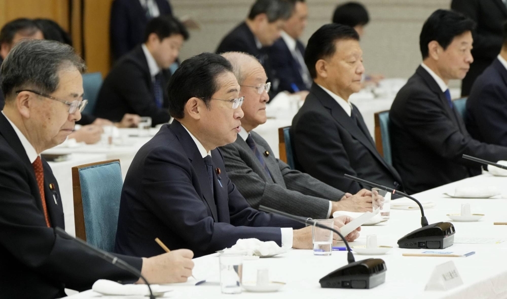 Prime Minister Fumio Kishida speaks to members of the government and the ruling parties in Tokyo on Wednesday.