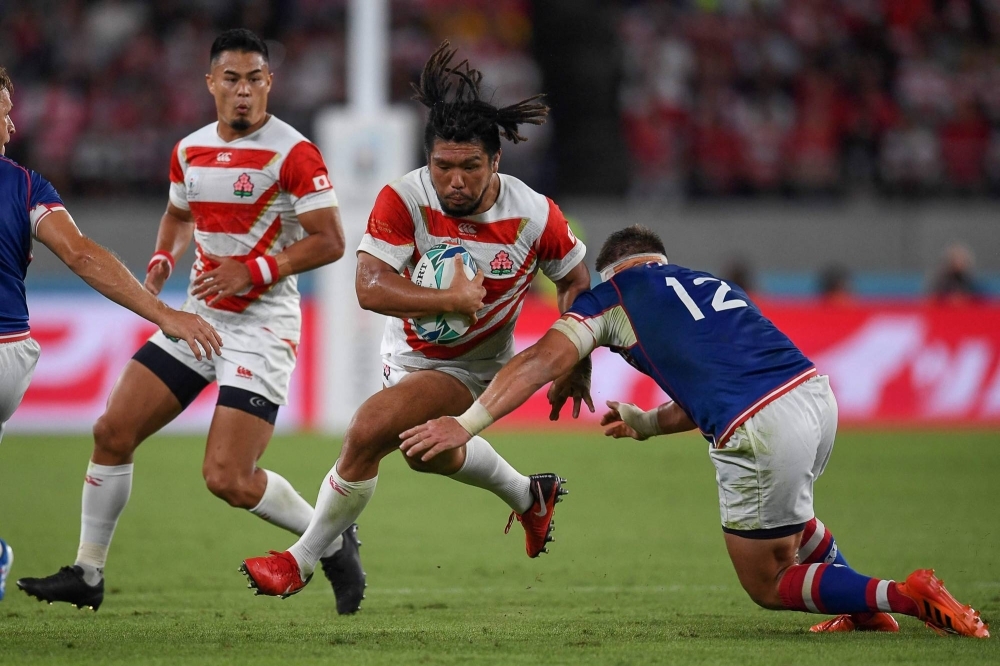 Japan hooker Shota Horie carries the ball in a match against Russia in the pool stage of the 2019 Rugby World Cup