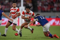 Japan hooker Shota Horie carries the ball in a match against Russia in the pool stage of the 2019 Rugby World Cup | AFP-JIJI