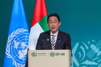 Prime Minister Fumio Kishida speaks during the High-Level Segment for Heads of State and Government session at the United Nations climate summit in Dubai on Friday. Kishida spoke with Israeli Prime Minister Benjamin Netanyahu on Wednesday regarding the situation in Gaza. | AFP-JIJI