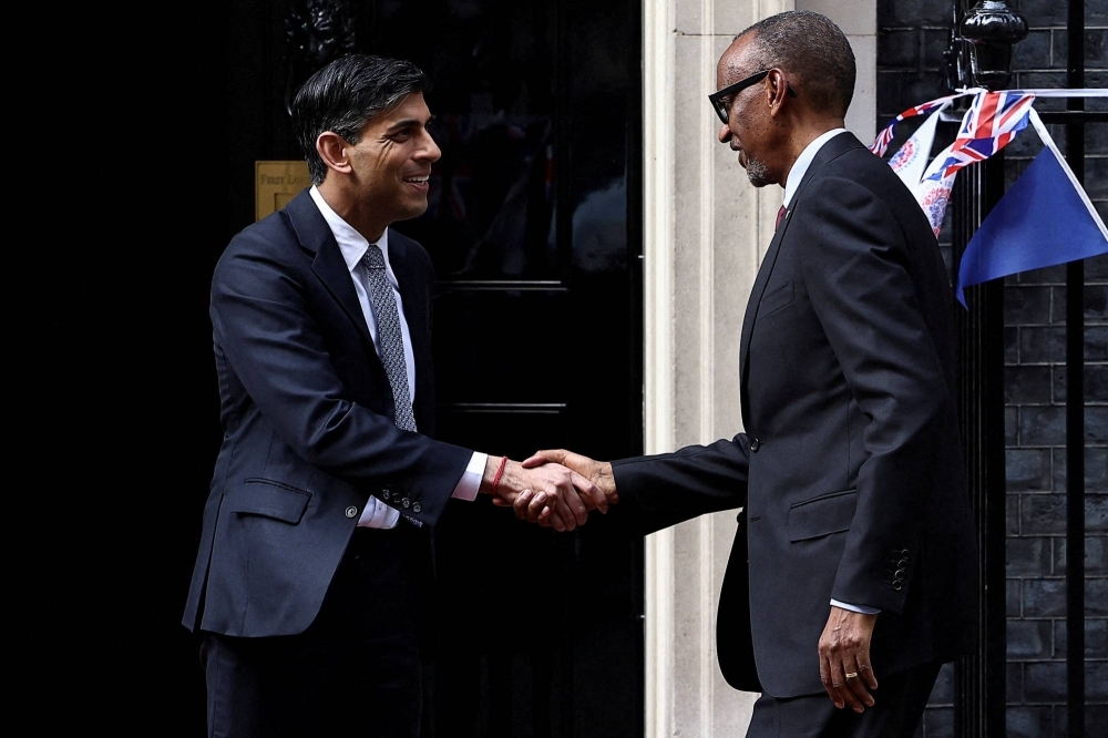 British Prime Minister Rishi Sunak greets Rwandan President Paul Kagame at Downing Street in London on May 4.