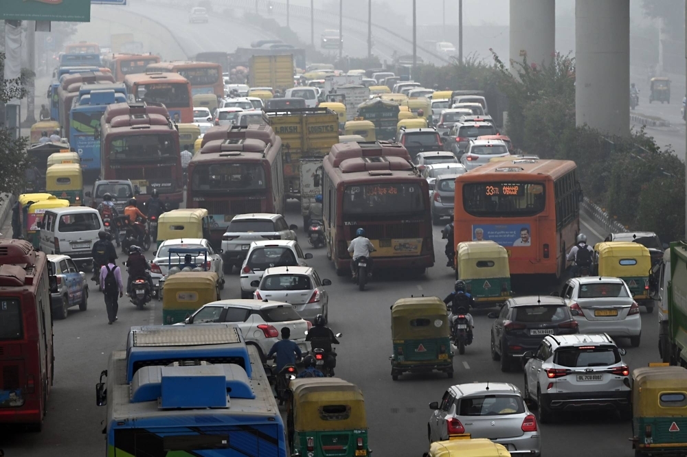 Traffic along a highway amid heavy smog and pollution in New Delhi in November