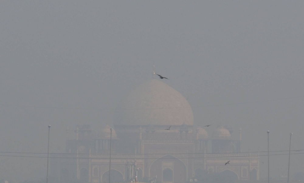A view of Humayun's Tomb amidst the morning smog as air pollution levels declined in New Delhi on Nov. 6