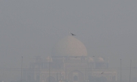 A view of Humayun's Tomb amidst the morning smog as air pollution levels declined in New Delhi on Nov. 6 | REUTERS