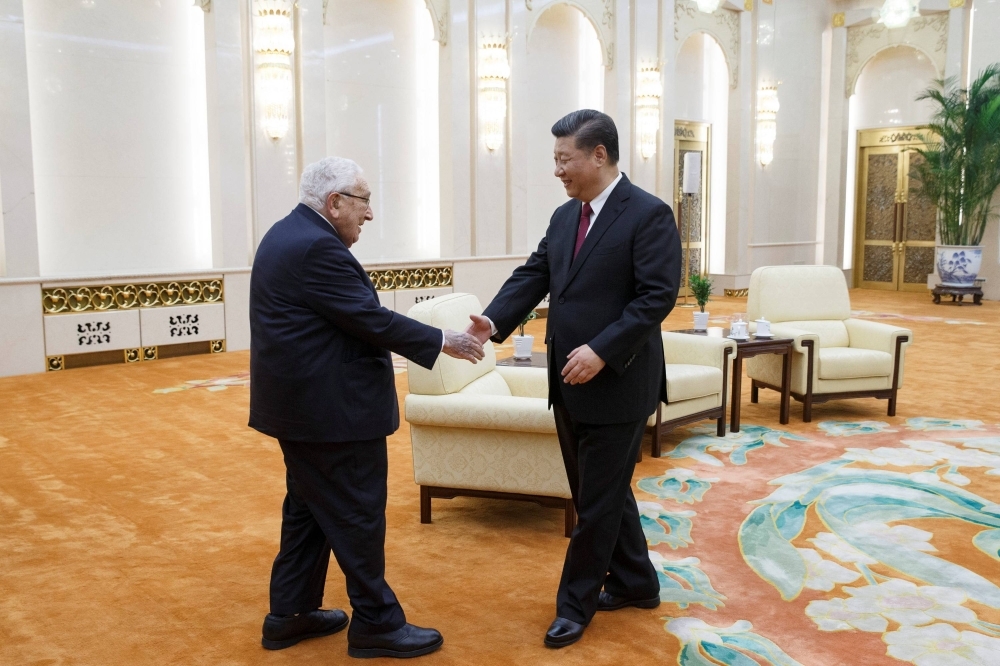 Chinese President Xi Jinping meets former U.S. Secretary of State Henry Kissinger at the Great Hall of the People in Beijing in November 2018.  
