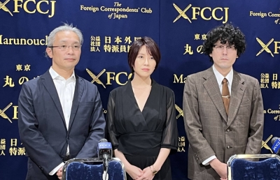Actress Midori Suiren (center), filmmaker Kenzo Kaga (right) and cinematographer Shin Hayasaka attend a news conference in Tokyo on Thursday.