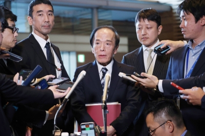 Bank of Japan Gov. Kazuo Ueda speaks to reporters after meeting with Prime Minister Fumio Kishida at the Prime Minister's Office on Thursday.