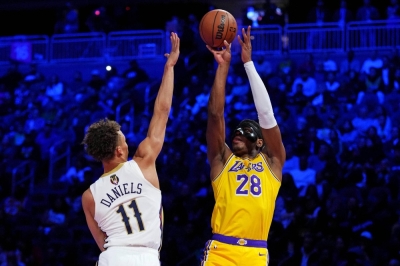 Los Angeles Lakers forward Rui Hachimura shoots over New Orleans Pelicans guard Dyson Daniels during the semifinals of the NBA In-Season Tournament in Las Vegas on Thursday. 