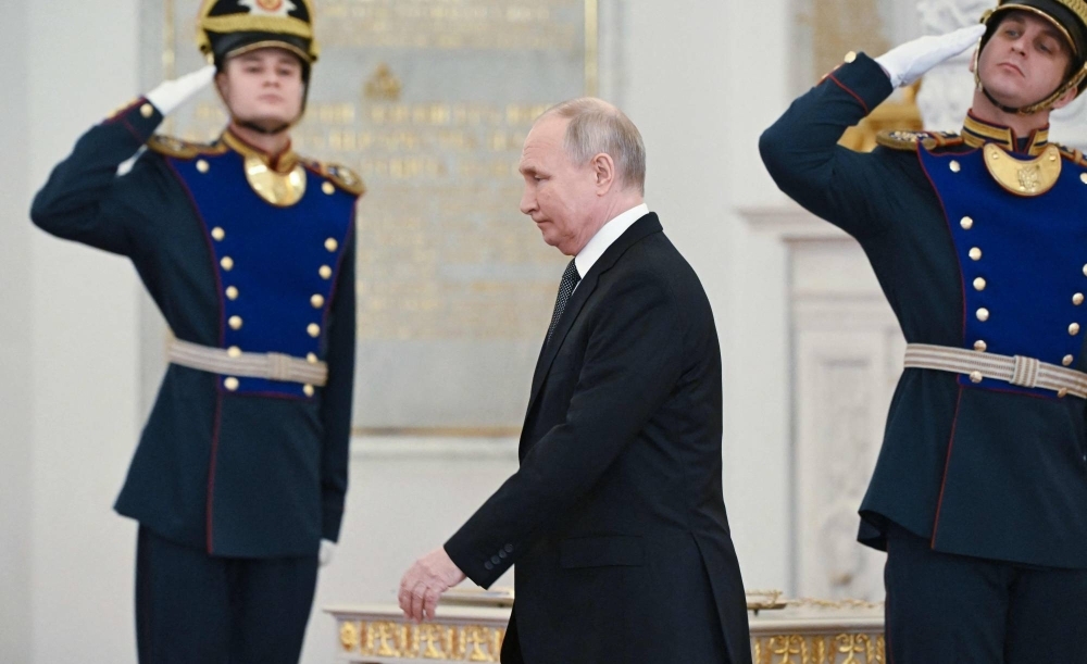 Russian President Vladimir Putin attends a ceremony to present medals to soldiers in Moscow on Friday. 