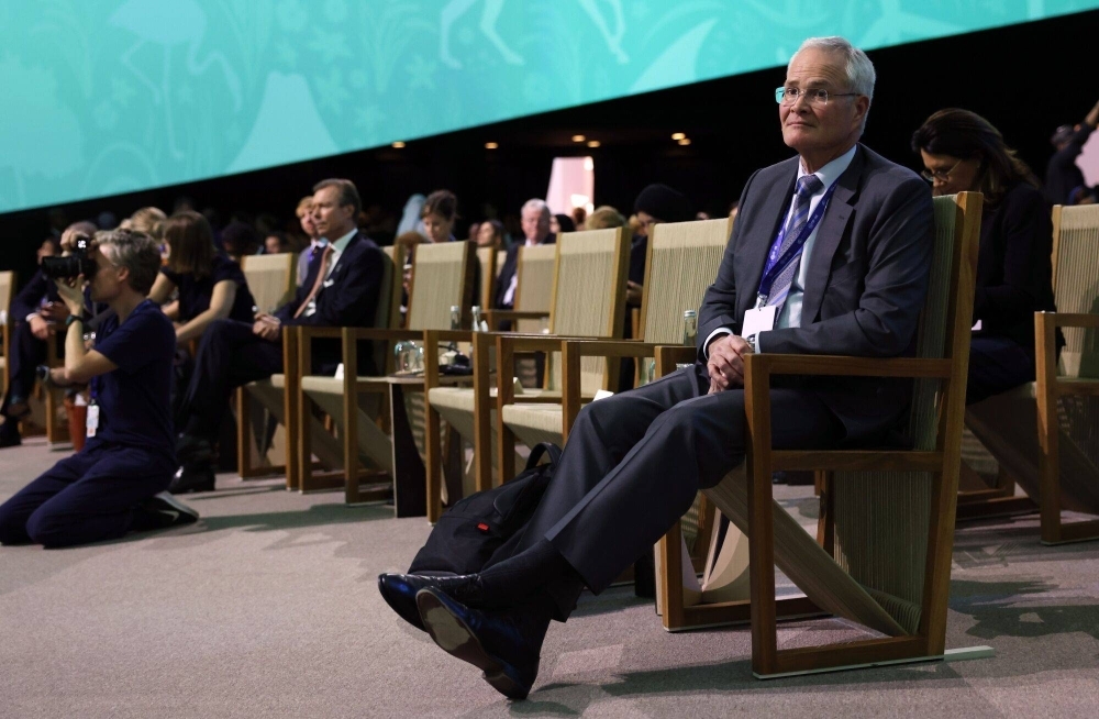 Darren Woods, CEO of Exxon Mobil, listens during a meeting at COP28 in Dubai on Dec. 2. 