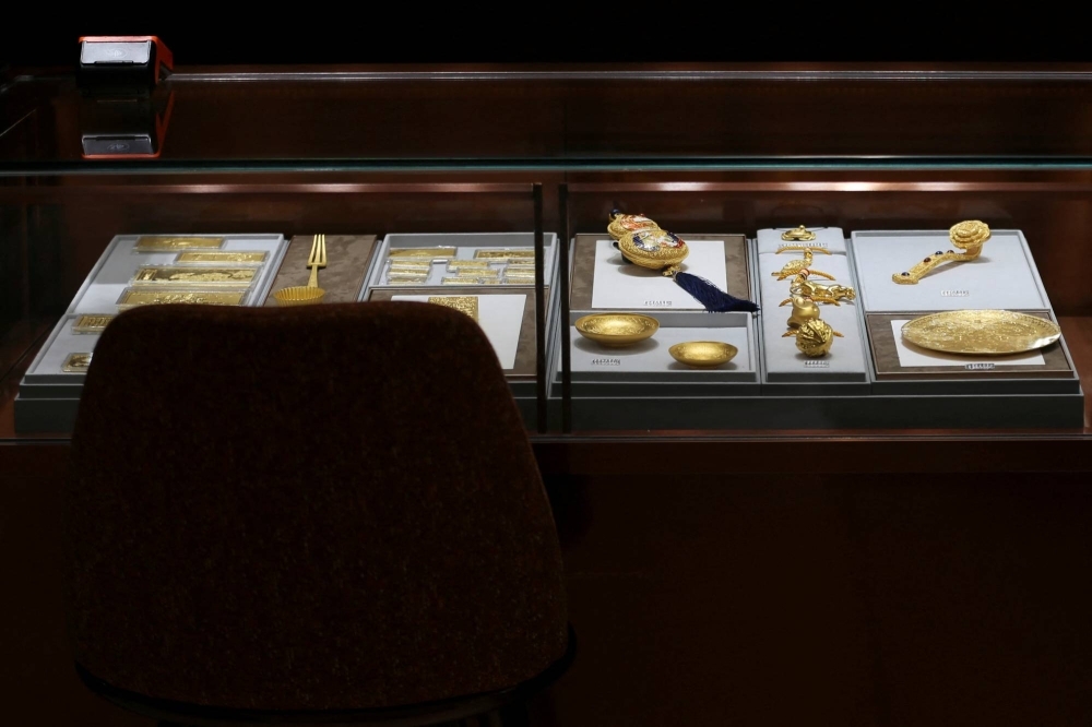 Gold ornaments on display for sale at a Chow Tai Fook jewellery store in Shanghai.