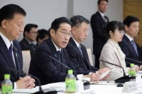 Prime Minister Fumio Kishida speaks at a government meeting on child policies on Monday. | Jiji