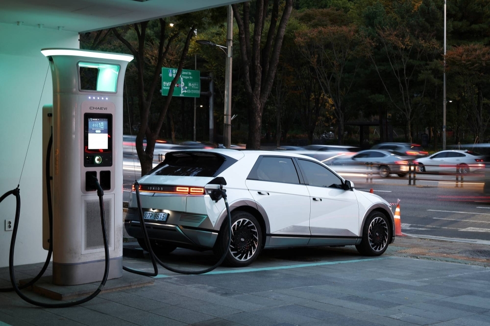 A Hyundai Ioniq 5 electric vehicle charges at Chaevi Stay Charging Station in Seoul on Oct. 18