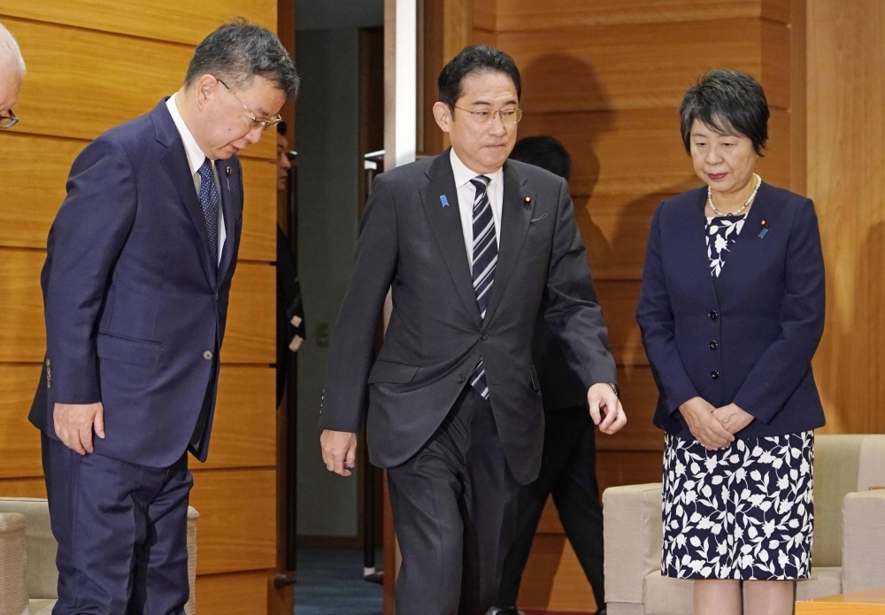 Prime Minister Fumio Kishida and Chief Cabinet Secretary Hirokazu Matsuno attend a Cabinet meeting in Tokyo on Tuesday.