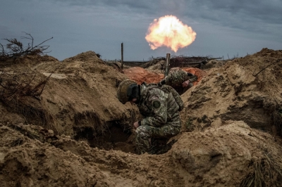 Ukrainian soldier fire a mortar near Kyiv on Nov. 8.
