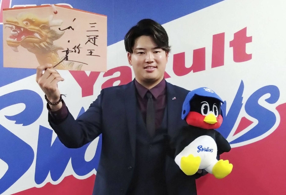 Yakult's Munetaka Murakami after finalizing contract negotiations, in Tokyo on Tuesday