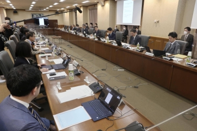 Members of an experts' panel on a central bank digital currency hold their first meeting, at the Finance Ministry in April.