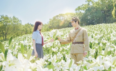 A sullen high schooler (Haruka Fukuhara, left) travels back in time and falls in love with a kamikaze pilot (Koshi Mizukami) in “Till We Meet Again on the Lily Hill.”