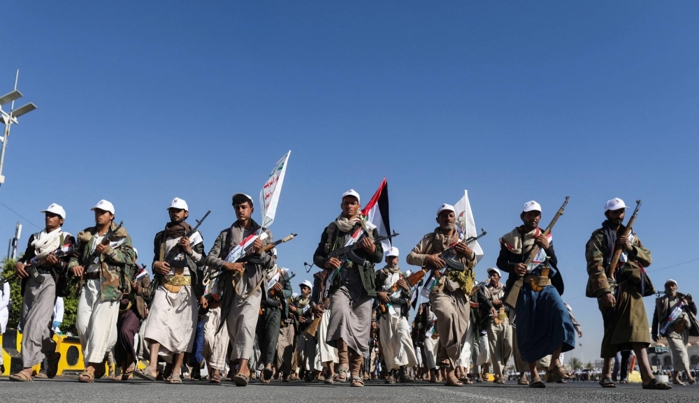 Newly recruited Houthi fighters march during a parade in Sanaa, Yemen, on Dec. 2.   REUTERS