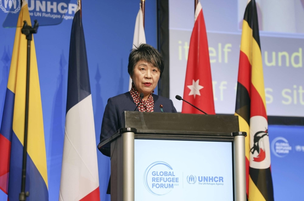 Foreign Minister Yoko Kamikawa gives a speech at the Global Refugee Forum in Geneva on Wednesday.