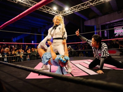 Sareee holds Konami by the limbs during a Sukeban event in Miami on Dec. 6. A unique form of Japanese wrestling that mixes fashion and theatrics has arrived in the United States.
