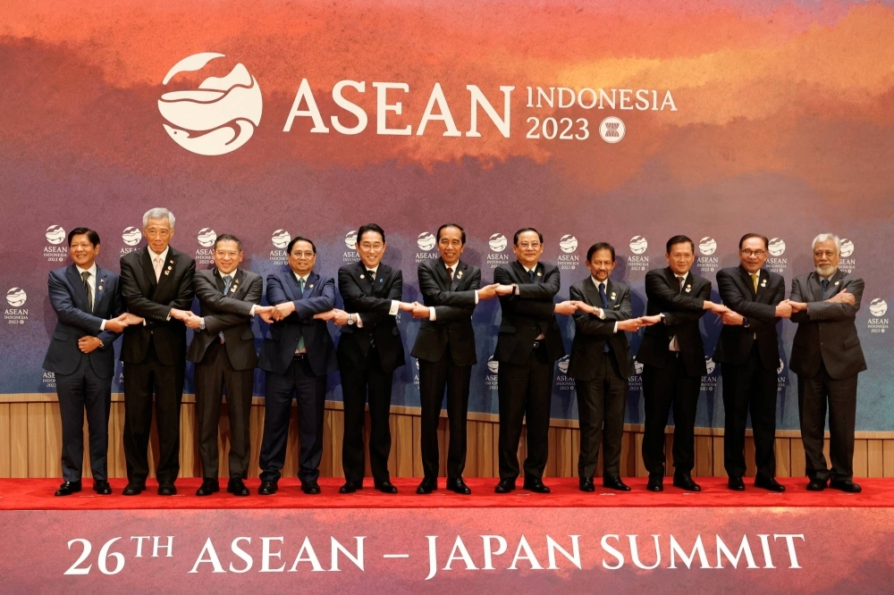 Prime Minster Fumio Kishida joins ASEAN leaders for a family photo before the start of the ASEAN-Japan summit in Jakarta in September.