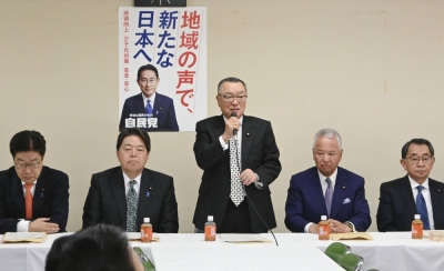 Yoichi Miyazawa, head of the Liberal Democratic Party's tax panel, speaks at its meeting at the party's headquarters in Tokyo on Thursday.