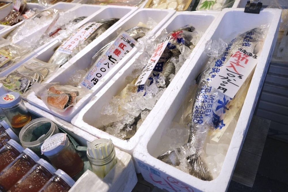 Salmon on sale in Sapporo on Dec. 1. The region has been hit hard by a Chinese ban on Japanese seafood products following the release into the ocean of treated, tritium-laced water from the Fukushima No. 1 nuclear power plant.