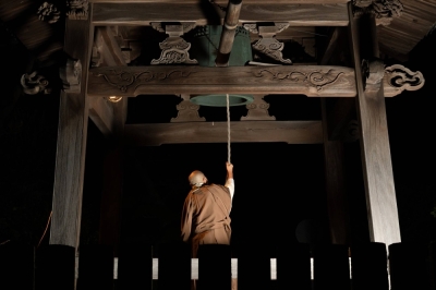A Japanese monk rings the bell at his temple. The bell is rung 108 times on New Year's Eve, a way to cleanse ourselves of the worldly desires. 