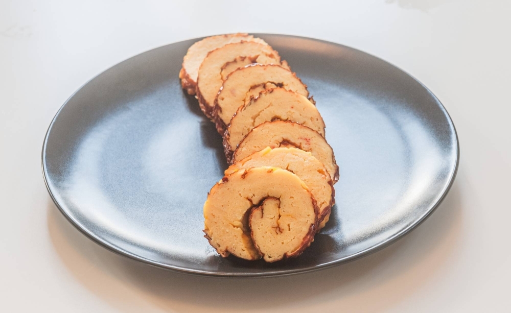 The only truly tricky part of this recipe is rolling the baked fish cake into the right shape. The only truly tricky part of this recipe is rolling the baked fish cake into the right shape.
