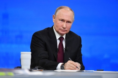 Russian President Vladimir Putin holding his year-end news conference at Gostiny Dvor exhibition hall in central Moscow on Thursday.