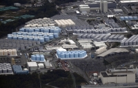 Water tanks containing treated radioactive water on the grounds of the Fukushima No. 1 nuclear power plant in October | Kyodo