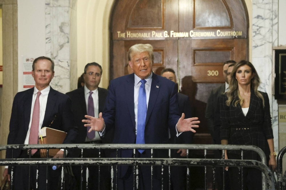 Former U.S. President Donald Trump speaks to reporters after testifying in his civil fraud trial at the State Supreme Court building in Manhattan,  New York, on Nov. 6.