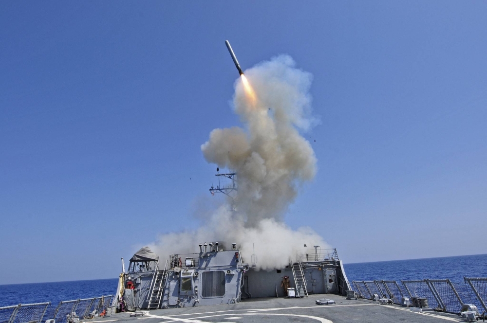 A Tomahawk cruise missile is launched from a U.S. Navy ship. Japan agreed with the United States to buy U.S.-made Tomahawk cruise missiles one year earlier than previously planned.