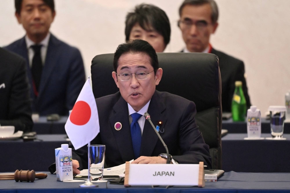 Prime Minister Fumio Kishida speaks during the opening session of the ASEAN-Japan Commemorative Summit Meeting at a hotel in Tokyo on Sunday.  