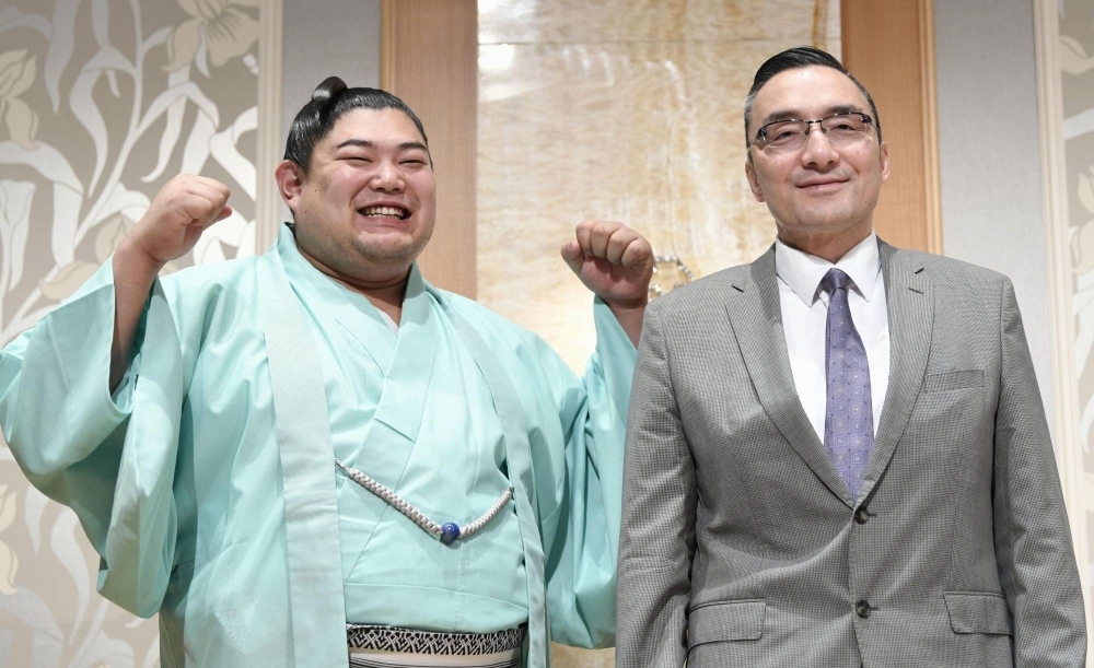 Sumo stablemaster Shikoroyama (right) with wrestler Abi in Nagoya in June 2019