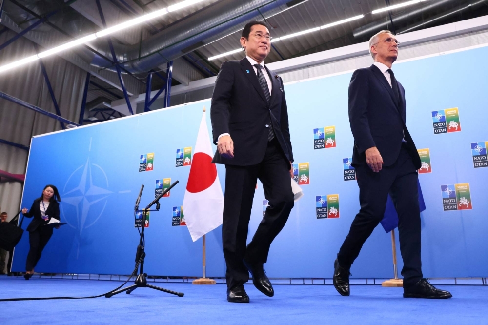 Prime Minister Fumio Kishida and NATO Secretary-General Jens Stoltenberg meet during a NATO summit in Vilnius, Lithuania, in July.