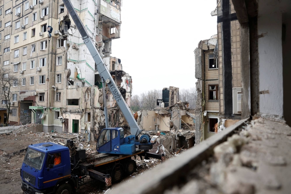 An apartment block that was heavily damaged by a Russian missile strike in Dnipro, Ukraine, on Jan. 18, 2023. Housing, transportation networks and various types of other infrastructure facilities across the nation have suffered substantial damage in the wake of Russia's invasion.