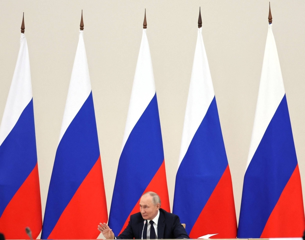 Russia's President Vladimir Putin attends a meeting near Moscow on Dec. 12.
