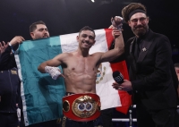 Luis Alberto Lopez celebrates after winning a fight against Josh Warrington in December 2022. | Action Images / via Reuters