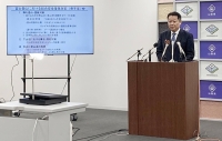 Yamanashi Gov. Kotaro Nagasaki speaks at a news conference at the prefectural government office on Wednesday. The prefecture is set to begin charging people to climb Mount Fuji. | Jiji