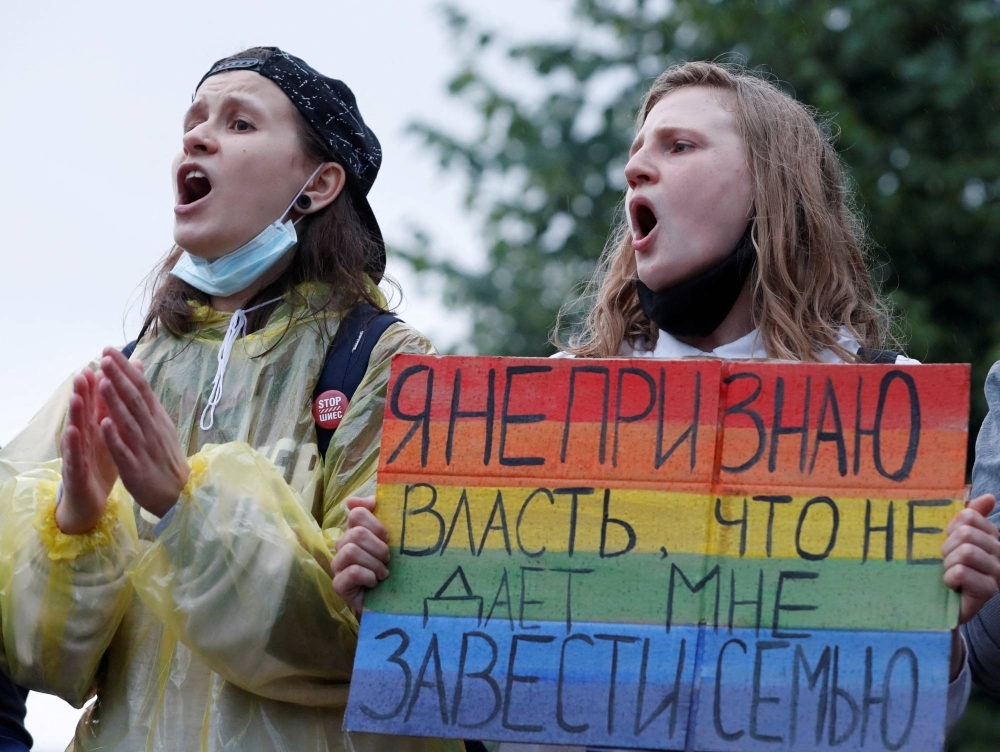 LGBTQ activists take part in a protest in Moscow.