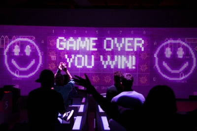 Competitors play "Warships" at Squid Game: The Trials, Netflixﾕs new attraction in Los Angeles on Nov. 28, 2023. For $30, fans can compete in some 70 minutes of play, with moral twists and six group activities, including nonlethal versions of the showﾕs challenges.
