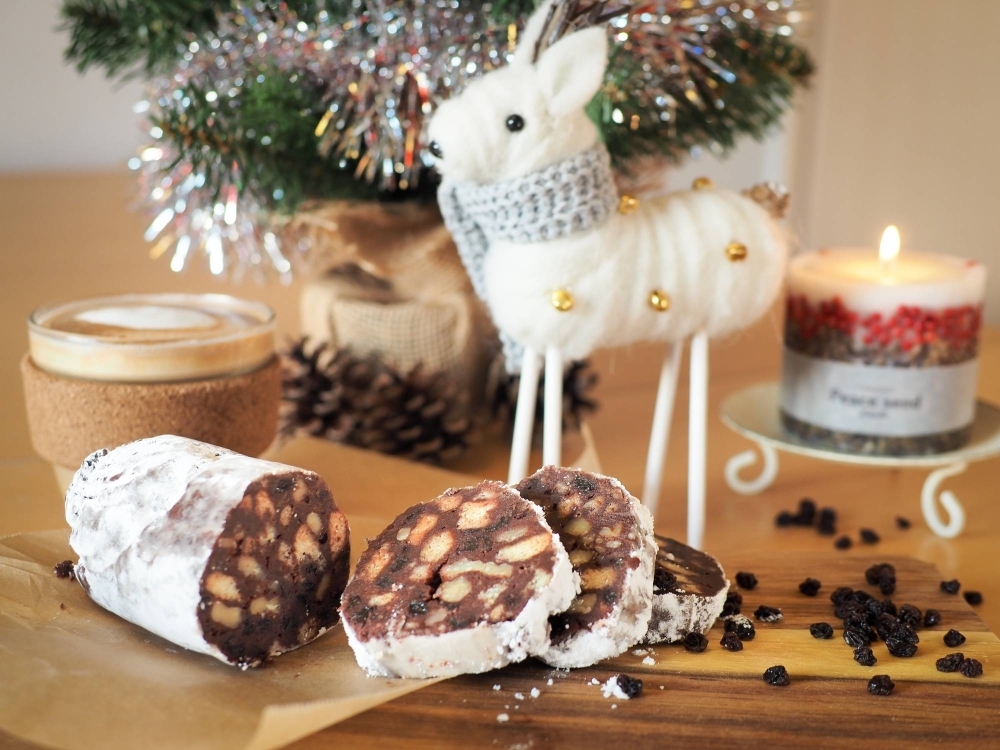 This chocolate salami dish is a no-bake truffle medley of chocolate ganache mixed with biscuits, nuts and dried fruit.