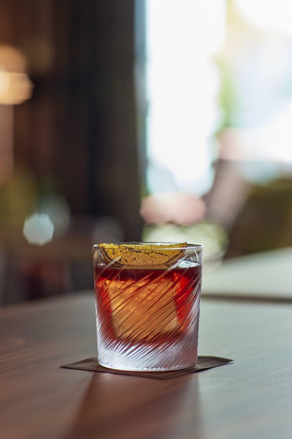 The Bulgari Bar's Roasted Negroni is a swirl of Tanqueray No. 10 gin infused with 'genmaicha' (roasted green tea), Campari and Mancino Chinato vermouth.
